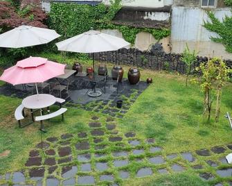 Daegu House - Hostel - Daegu - Patio