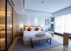 Shama Serviced Apartments Zijingang Hangzhou - האנגג'ואו - חדר שינה