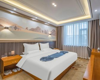 Mclaren Business Hotel (Xingtai No. 23 Middle School Branch) - Xingtai - Bedroom
