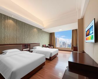 Yangjiang Minghao Hotel - Yangjiang - Bedroom
