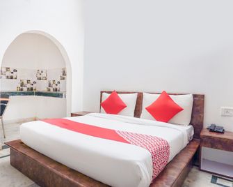 Hotel O Ratiram Palace by Wamson - Noida - Schlafzimmer