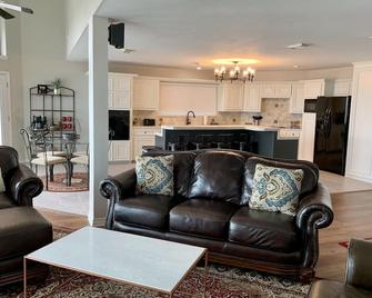 Beautiful 3 Story Lake Front Home with boat lift! - Onalaska - Living room