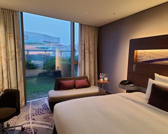 Novotel Ambassador Suwon - Suwon - Makuuhuone