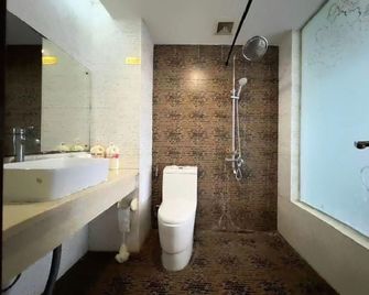 Jinghong Salad Hotel - Xishuangbanna - Schlafzimmer