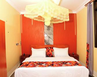 Amazing 2-bedroom apartment with WiFi in Fort Portal - Fort Portal - Bedroom