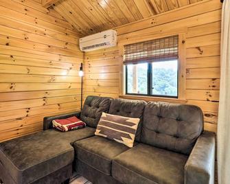 Sparta Tiny Cabin with Covered Deck and River Access! - Sparta - Living room