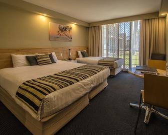 موتل 98 - روكامبتون - غرفة نوم