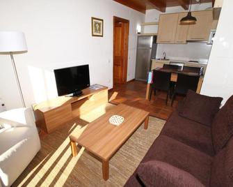 Apartamentos Snö Mont Romies Unhola - Naut Aran - Living room
