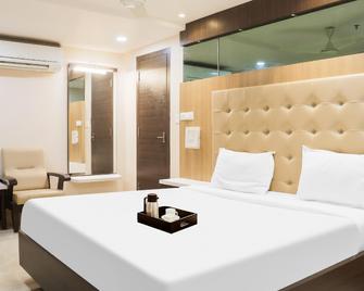 OYO Townhouse 1195 Hotel Vihari - Ellore - Bedroom