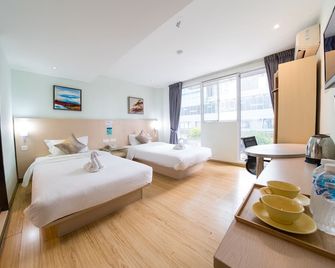 Hotel City Comfort Inn - Puchong - Yatak Odası