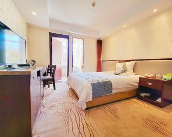 Phoenix Garden Hotel - Yantai - Camera da letto