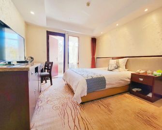 Phoenix Garden Hotel - יאנטאי - חדר שינה