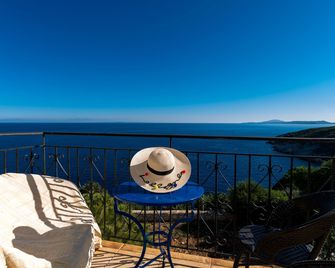 Potamitis Windmills & Apartments - Korithi - Balcón