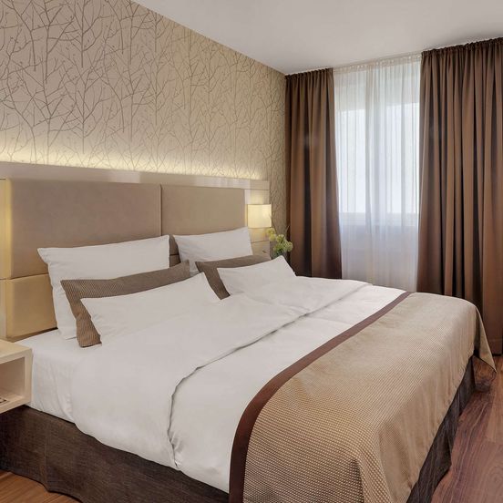 Bedroom view of Boutique Hotel Atrium München