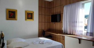 Colle Tourist Hotel - Criciúma - Habitación