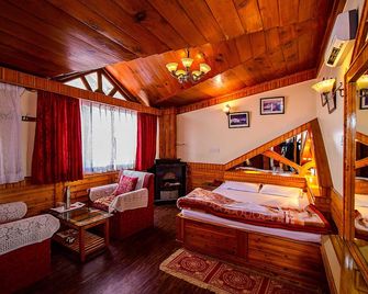 Hotel Dolphin Darjeeling - Darjeeling - Slaapkamer