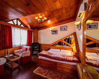 Hotel Dolphin Darjeeling - Darjeeling - Habitación