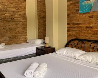 Mabini Hotel - Mambajao - Bedroom