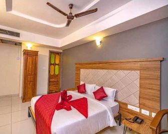 Hotel Srm Grandeurs - Tada - Habitación
