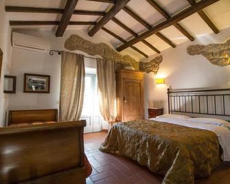 Bio Agriturismo Poggio Aione - Semproniano - Спальня