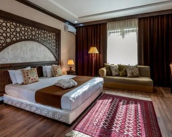 Orient Star Hotel - Самарканд - Спальня