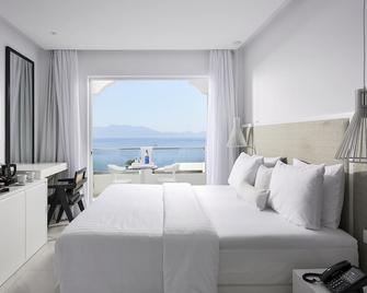 Dimitra Beach Hotel & Suites - Agios Fokas - Bedroom