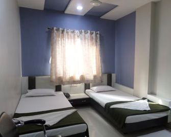 Hotel Sanket Regency - Sangli - Bedroom