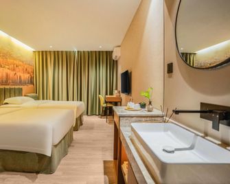 Qiankunrun Boutique Hotel (Jiang Bei Old Shteet Store) - Meizhou - Bedroom