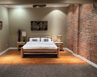 The Brick-Road Penthouse - Kokomo - Schlafzimmer