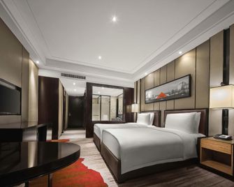 Panjin Wanda Realm Hotel - Panjin - Bedroom