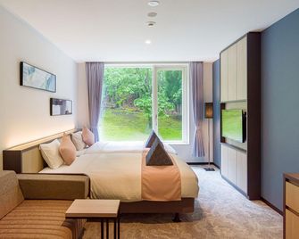 Taoya Aso - Aso - Schlafzimmer