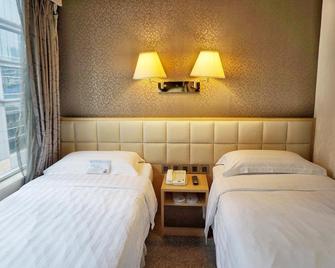H1 Hotel - Hongkong - Schlafzimmer