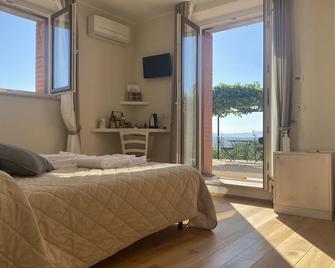Podere Belsogno-Camera Lavanda - Montalcino - Bedroom