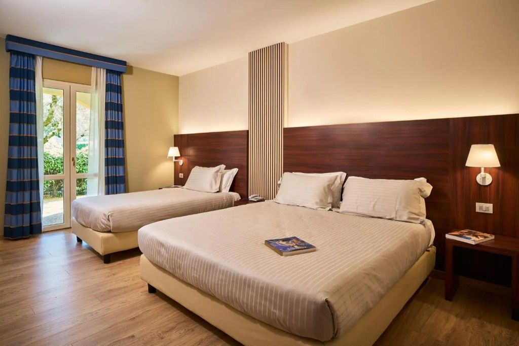 ديلفينا بالاس هوتل - فوليجنو - غرفة نوم