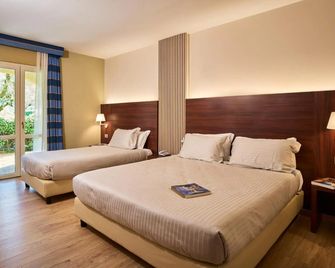 ديلفينا بالاس هوتل - فوليجنو - غرفة نوم