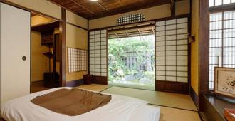 Guesthouse Koiya - Kioto - Makuuhuone