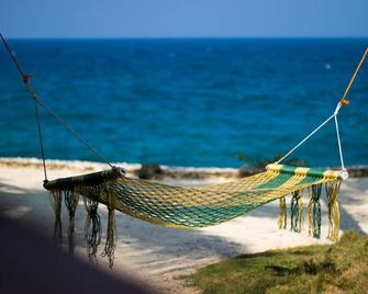 Kah Motes Private Resort - Poro - Strand