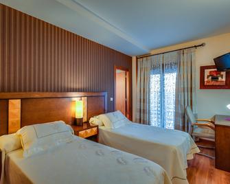 Hotel Ciudad de Martos - Martos - Bedroom