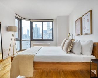 Gorgeous Tribeca 2BR w/ Amazing city views + Gym by Blueground - New York - Bedroom