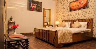 Hotel Meenakshi Udaipur - Udaipur - Schlafzimmer