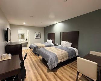 Scottish Inn & Suites - Iah Airport - Humble - Habitación
