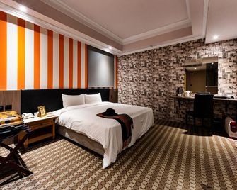 All Fun Business Hotel - Taichung City - Bedroom