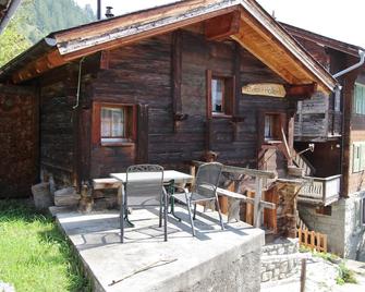 Rustic wooden chalet in Betten Valais near the Aletsch Arena ski area - Bettmeralp - Patio