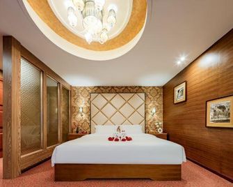 Longma Hotel - Honghe - Bedroom
