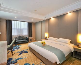 Guomao Hotel - Yueyang - Slaapkamer