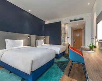 Holiday Inn Express Qingdao Chengyang Central By IHG - Qingdao - Bedroom