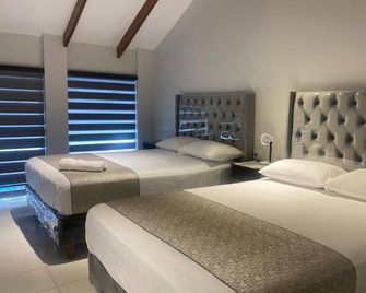 Hostal Amaca - סנטה קרוס - חדר שינה