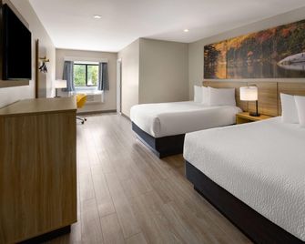 Days Inn by Wyndham Moosic - Moosic - Bedroom