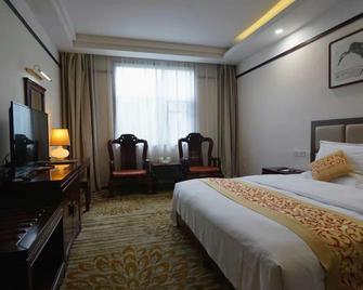Xizhi Hotel - Linyi - Bedroom