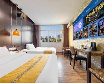 Bati Yangguang Chain Hotel Meizhou Meilong - Meizhou - Bedroom